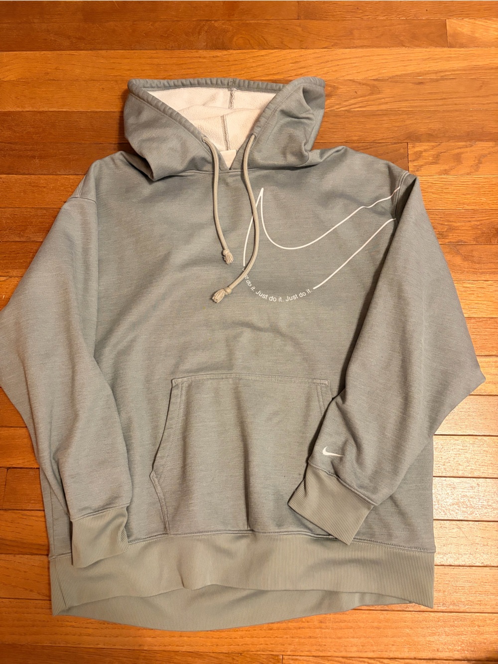 Nike Gray Pullover Hoodie with White Swoosh Accent